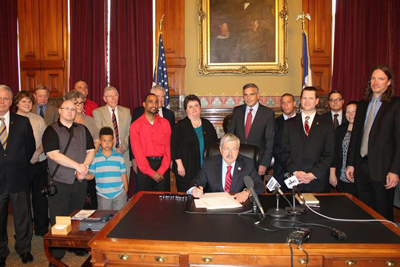 I attended the signing of the HIV Decriminalization Bill by Iowa Gov. Terry