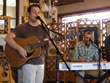 Tom Goss and Jeremiah Clark perform at Presque Isle Gallery Coffeehouse