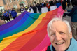 Charles Beal, President, Gilbert Baker Foundation with Rainbow Flag