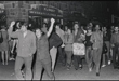 1969 Gay Liberation Front members Jerry Hoose (left), Mark Segal (right), and Sylvia Rivera (background, holding a bag)