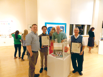 Joshua Burford, Blair Burdette, Gene Sloan and Sue Henry were on hand at the Sept. 17 archive naming ceremony. Photo by QNotes Staff